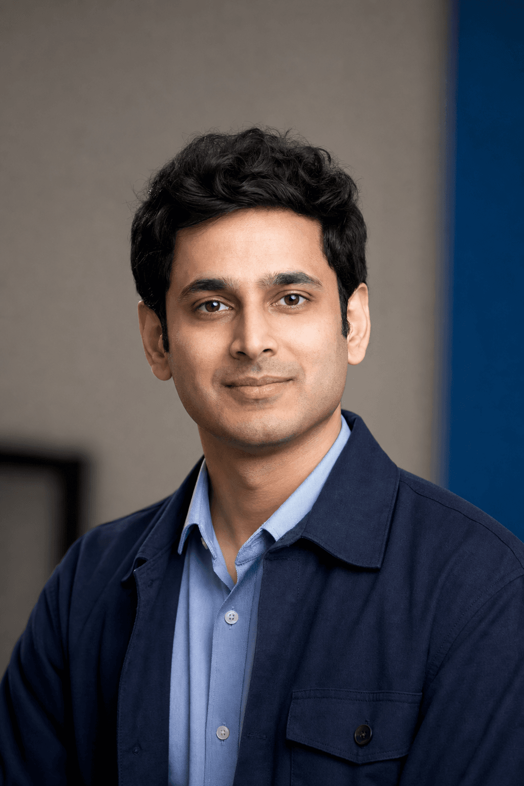 AI-generated corporate portrait representing Aryan Kulkarni